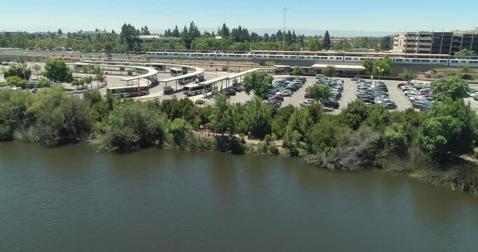 Commuters in Fremont, California, USA, use public transportation. Buses and a Bay Area Rapid Transit (BART) train provide options for travel in the Bay Area.