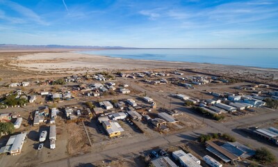 Aerial view of Bombay Beach, a town in California, USA, showing the community's unique desert landscape and proximity to the Salton Sea.