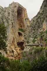 The famous El Caminito del Rey in Malaga with its amazing views with trees, mountains, river and a...