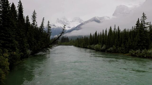 View of the Bow River in Slow Motion from The Canmore Engine Bridge in Alberta Canada