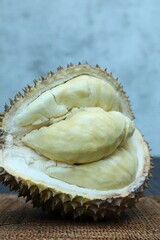 Fresh ripe durian on table outdoors, closeup