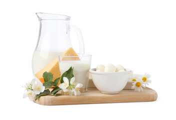 Different fresh dairy products and flowers isolated on white