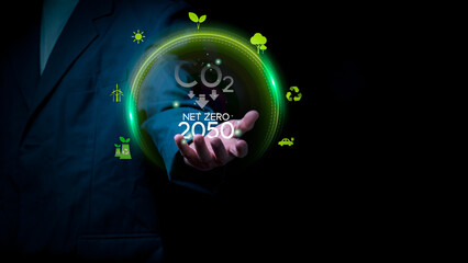 Businessmen are showing green cities in 2050 where CO2 emissions net zero, the idea of ​​reducing global warming or preventing the world's worst climate change.