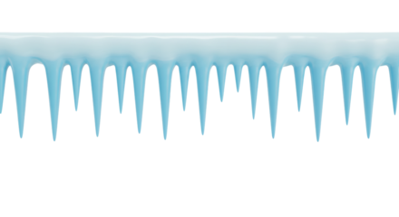 A close up view of light blue icicles hanging down from a white surface against 