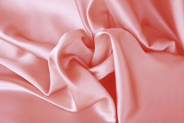 Silk satin cotton wavy gentle fabric background. Light pale pastel white pink blush tea rose salmon...