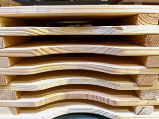 Stacked Wooden Planks Showing Smooth Curves and Texture