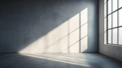 Fototapeta premium Empty room with concrete wall, floor, and large window with sunlight streaming through
