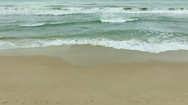 Nature of the beach and sea Summer with sunshine, sandy beaches, clear blue waters sparkling against the blue sky. On an island with good ecology and environment Background for summer vacation