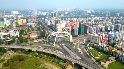 Fototapeta premium Aerial view of Biswa Bangla Gate, This is an arch-monument in the city of New Town, Kolkata, West Bengal, India.
