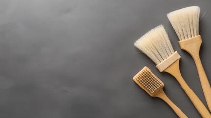 Various Brushes on a Smooth Gray Background for Art and Craft Projects