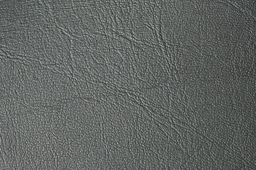Black leather texture background close-up surface detail
