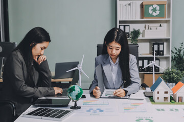 Business team people planning and discussing on recycle reduce reuse policy symbol in office meeting room.