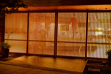 Japanese style house with wooden door (sliding door and lattice door) /...