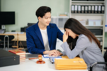 business people and lawyers discussing contract papers sitting at the table. Concepts of law, advice, legal services.