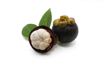 Mangosteen with cut in half and leaves isolated on white background. Clipping path.