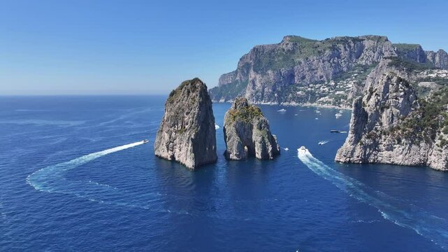 Faraglioni Island In Capri Naples Italy. Breathtaking Aerial View Of A Lush Tropical Coastline Scenery. Shore Sky Clouds Beach Sea. International Beach Panoramic. Capri Naples.