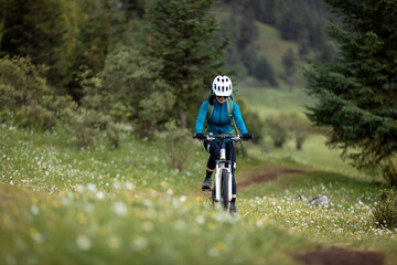 Riding mountain bike in the beautiful mountains