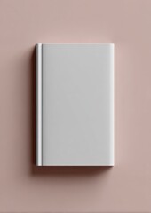 Elegant blank hardcover notebook with elastic band lying on soft pink background ideal for writing journaling and note taking