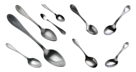 Silver Spoons of Various Sizes Spread Out on a White Background, isolated on transparent background