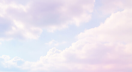Obraz premium Soft, pastel-colored clouds fill the sky, creating a serene and dreamy atmosphere with light blue peeking through.