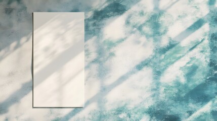 Blank Poster Mockup on Teal Textured Wall with Sunlight Shadows