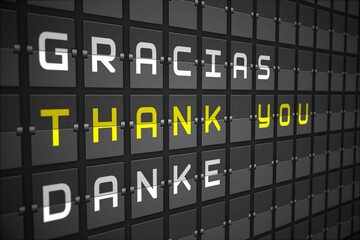 Thank you in languages on black mechanical board