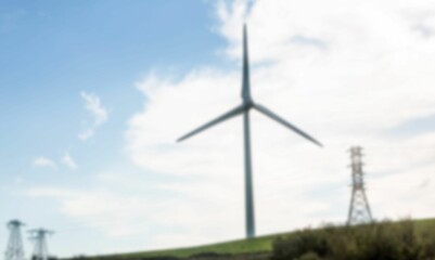Fototapeta premium Wind turbine on field against sky