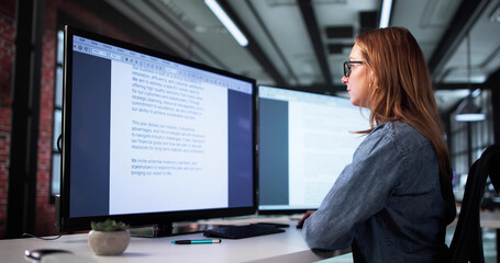 Young Analyst Woman Reading Business Plan