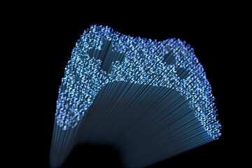 Video game controller against black background