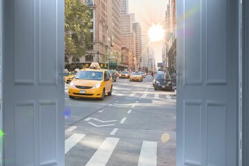 Fototapeta premium City street seen from open door