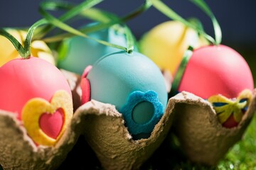 Close-up of colorful Easter eggs in crate