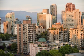 Modern buildings in city during sunset