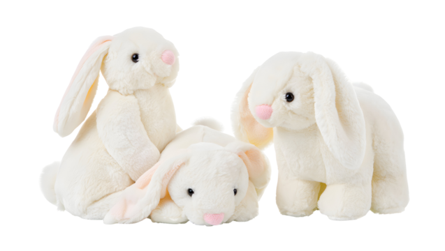 Three fluffy white plush bunnies with pink noses and long ears isolated on a transparent background