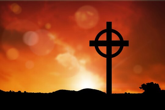 Fototapeta Cross religion symbol shape over sunset sky