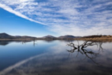 Scenic scene of river against cloudy sky