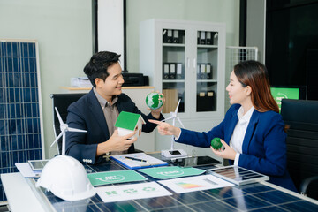 Business team people planning hand using laptop for working technology and business Net zero and carbon neutral concept.