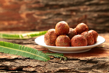 Plate of delicious and spicy gooseberry pickle - Traditional Indian vegetarian recipes.
