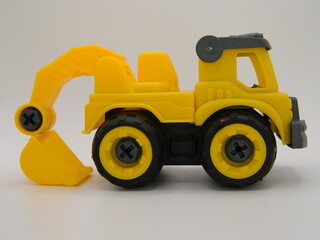 Photo of contruction vehicle toy (Excavator). Can be used for t-shirt print, kids wear fashion design