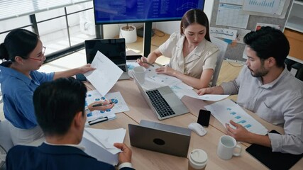 Group of creative Businesspeople brain storm meeting presentation,discussing roadmap to product launch, planning,strategy,dashboard,new business development,working with new startup project in office