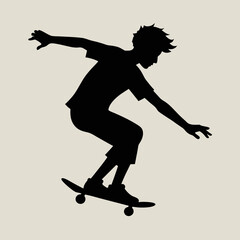 Silhouette of a young person performing a trick on a skateboard