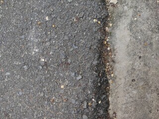The rough surface texture of asphalt and cement