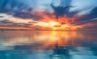 Fototapeta premium Serene sunset over calm ocean waters