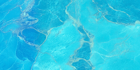 Abstract close-up of a luxurious blue and gold marble surface, soft Blue marble surface with rough texture, White and blue marble background for decor.