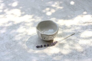 Handmade ceramic bowl with dried lavender
