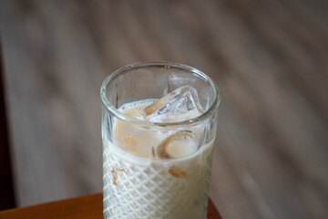 Iced Salted Caramel Latte, Indonesia, captured on June 29, 2025. A refreshing espresso drink mixed...