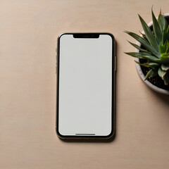 Smartphone with a blank green screen rests on a table