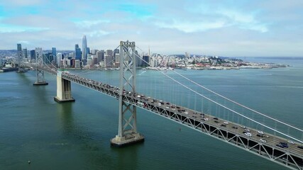 Static drone shot of Oakland Bay Bridge and San Francisco skyline 60 FPS