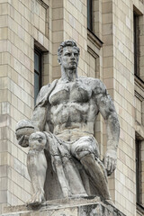 statue on the facade of the building