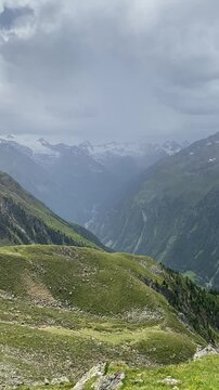 Dramatic rocky peak surrounded by alpine landscape in Austrian Alps