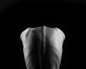 Beautiful female body part on black background.	